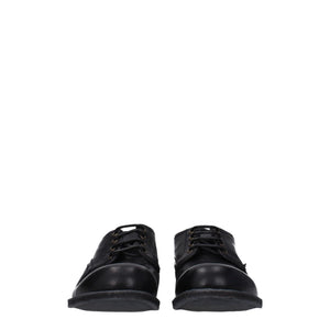 Schwarze Leder Oxfords und Derbies