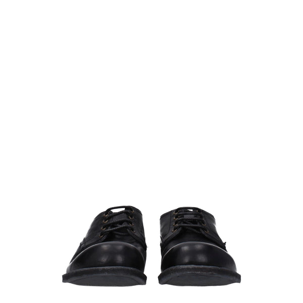 Schwarze Leder Oxfords und Derbies