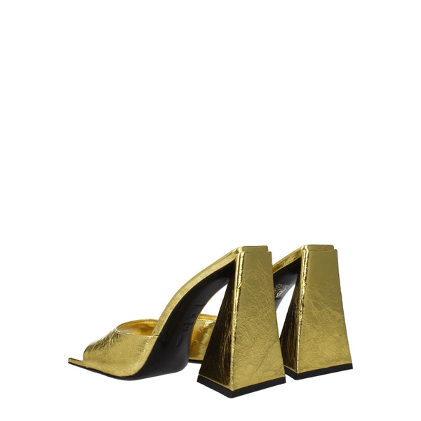 Goldene Ledersandalen mit Plateauabsatz