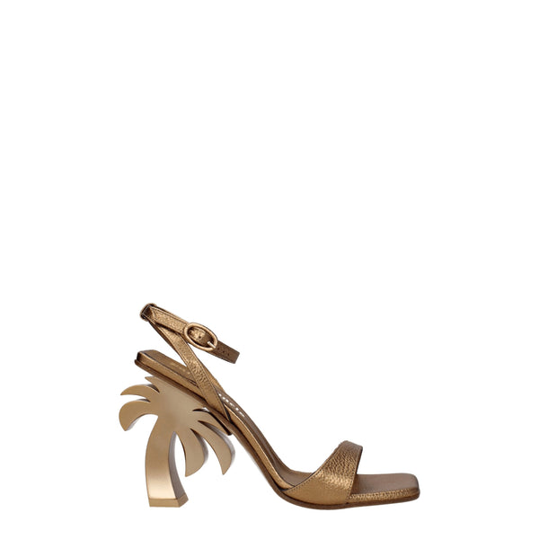 Goldene Ledersandalen mit Plateauabsatz