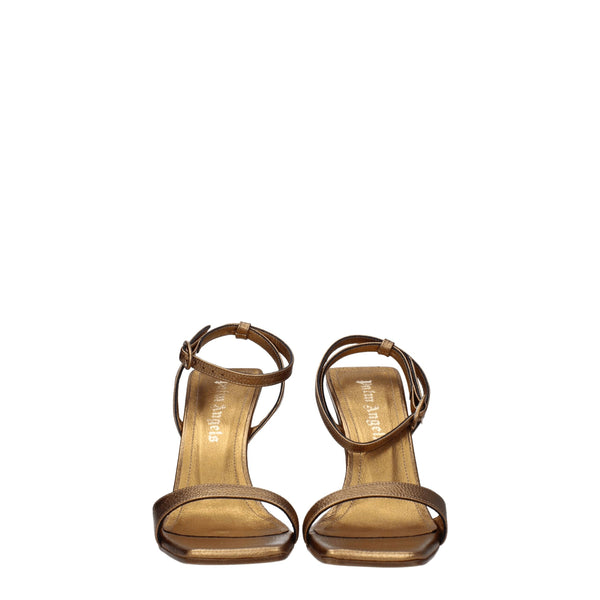 Goldene Ledersandalen mit Plateauabsatz