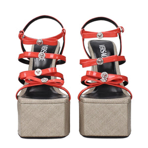 Sandalen mit Plateauabsatz aus orangefarbenem Leder