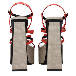 Sandalen mit Plateauabsatz aus orangefarbenem Leder