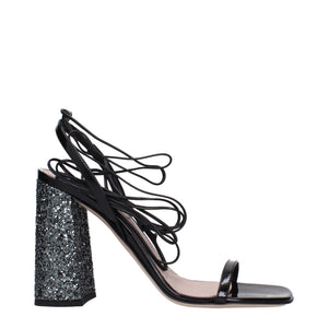 Schwarze Ledersandalen mit Plateauabsatz