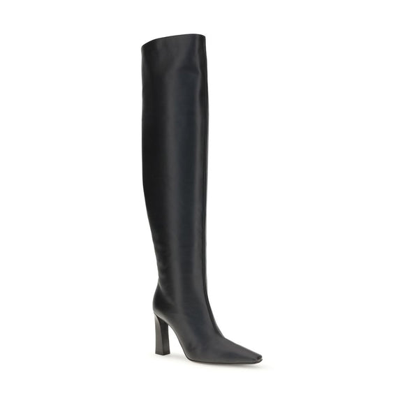 Schwarze Lederstiefel über dem Knie