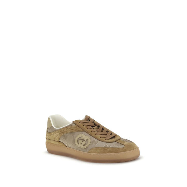 Beigefarbene Leder-Sportschuhe