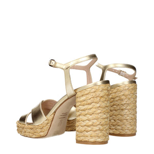 Goldene Leder-Plateau-Sandalen