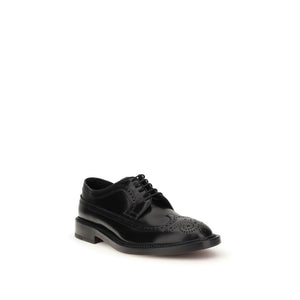Schwarze Leder-Schnürschuhe und -Derby-Schuhe