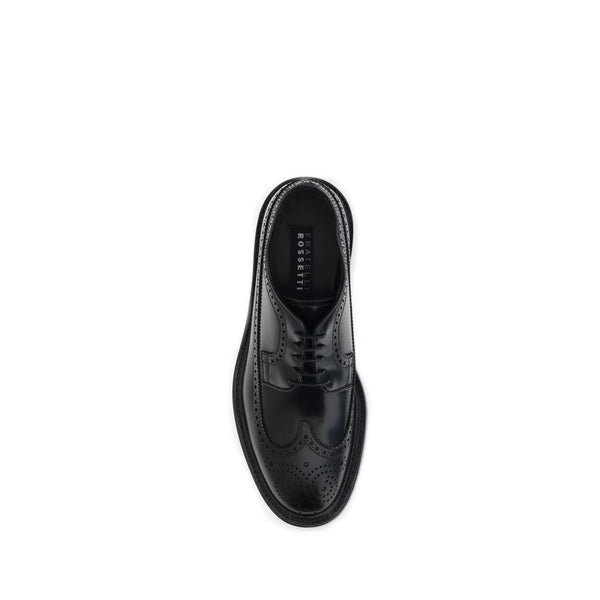 Schwarze Leder-Schnürschuhe und -Derby-Schuhe