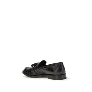 Schwarze Gummilaufschuhe zum Hineinschlüpfen