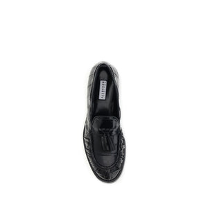 Schwarze Gummilaufschuhe zum Hineinschlüpfen