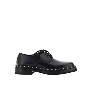 Schwarze Oxford- und Derby-Schuhe aus Kalbsleder
