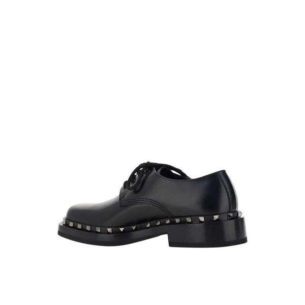Schwarze Oxford- und Derby-Schuhe aus Kalbsleder