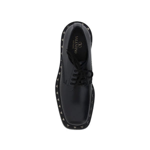 Schwarze Oxford- und Derby-Schuhe aus Kalbsleder