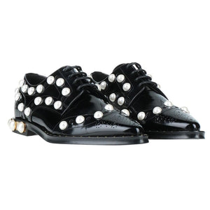 Schwarze Leder Oxfords und Derby