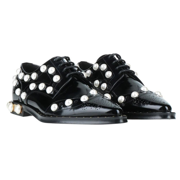 Schwarze Leder Oxfords und Derby