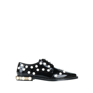 Schwarze Leder Oxfords und Derby