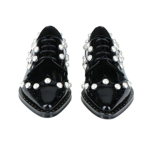 Schwarze Leder Oxfords und Derby