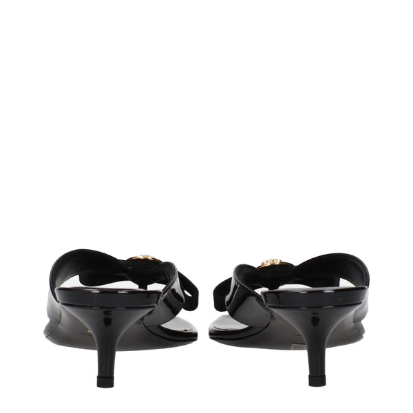 Schwarze Leder-Stilettos mit hohen Absätzen