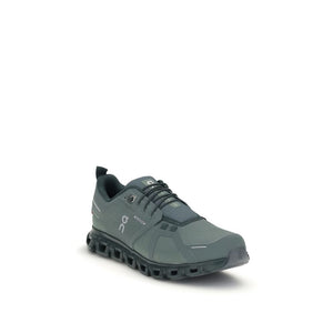 Grüne Stoff-Sportschuhe