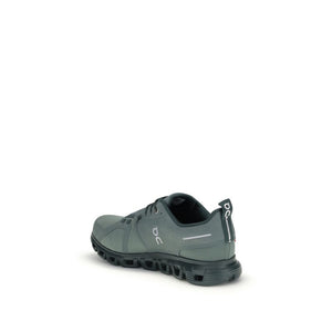 Grüne Stoff-Sportschuhe