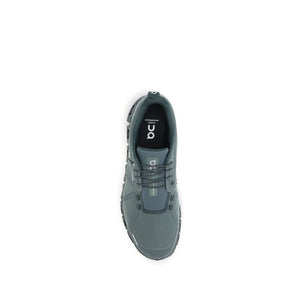 Grüne Stoff-Sportschuhe