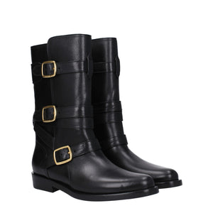 Flache Stiefel aus schwarzem Leder