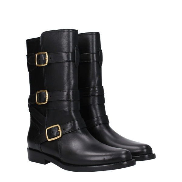 Flache Stiefel aus schwarzem Leder