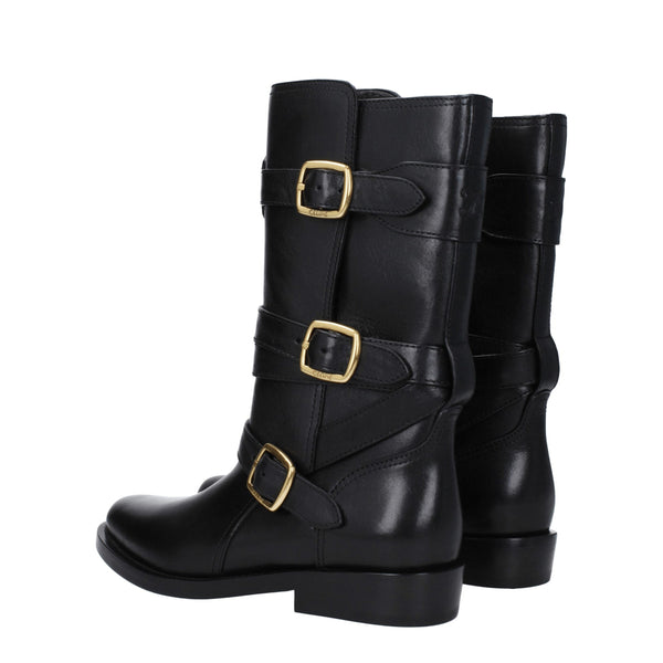 Flache Stiefel aus schwarzem Leder