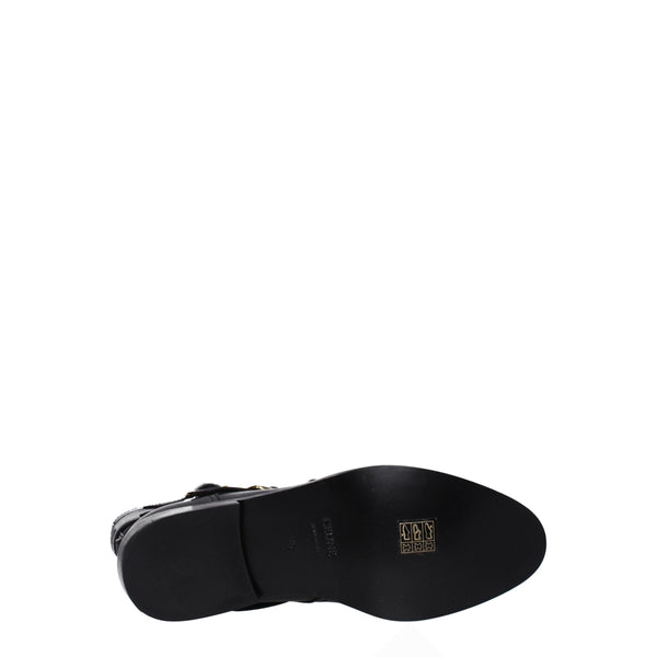 Flache Stiefel aus schwarzem Leder