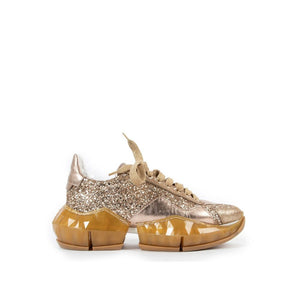 Goldene Kalbshaut-Sneaker mit klobiger Sohle