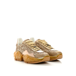 Goldene Kalbshaut-Sneaker mit klobiger Sohle