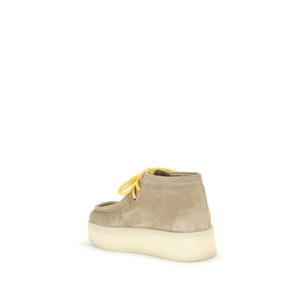 Beigefarbene Plateau-Sneaker aus Gummi