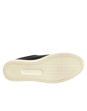 Schwarze Leder-Sneaker mit Sacred-Heart-Motiv