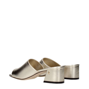 Goldene Leder-Plateau-Sandalen