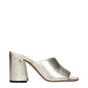 Goldene Ledersandalen mit Plateauabsatz