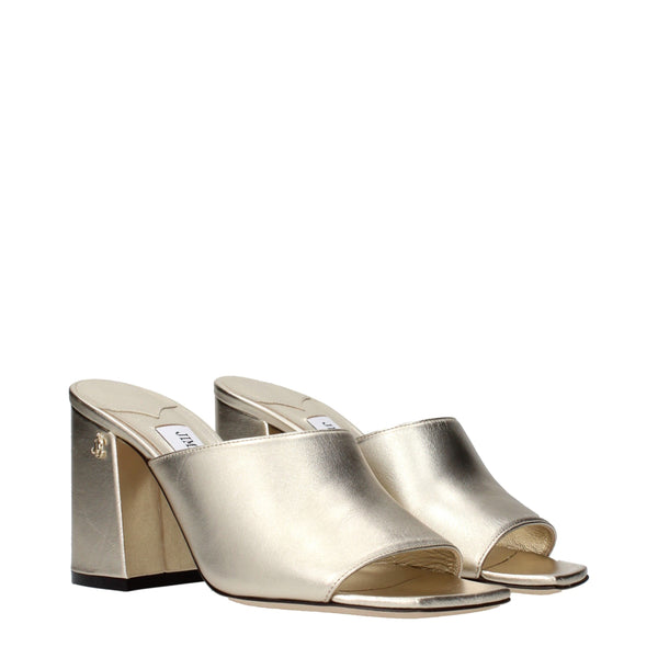 Goldene Ledersandalen mit Plateauabsatz