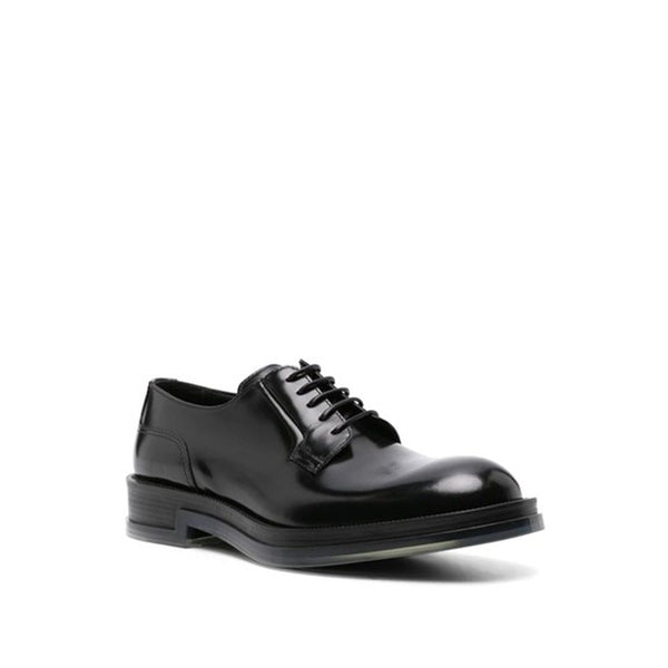 Schwarze Oxford- und Derby-Schuhe aus Kalbsleder