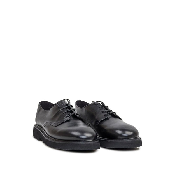 Schwarze Kalbsleder-Oxfords und -Derbies