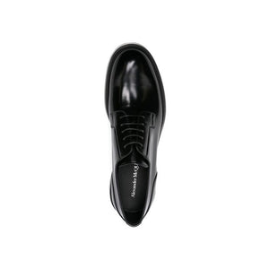 Schwarze Oxford- und Derby-Schuhe aus Kalbsleder