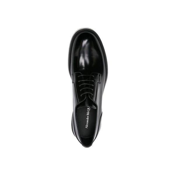 Schwarze Oxford- und Derby-Schuhe aus Kalbsleder