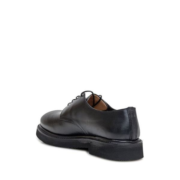 Schwarze Kalbsleder-Oxfords und -Derbies