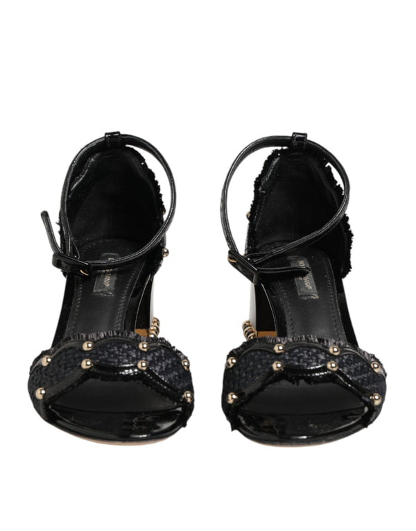 Schwarze Sandalen mit Nieten und Knöchelriemen