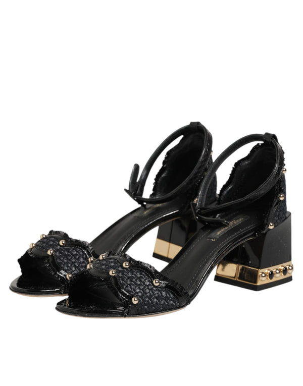 Schwarze Sandalen mit Nieten und Knöchelriemen
