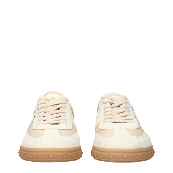 Beigefarbene Sneakers aus Stoff mit niedrigem Schaft