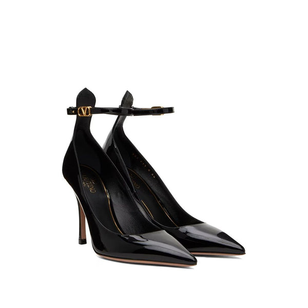 Schwarze Leder-Pumps mit hohem Absatz
