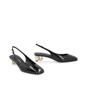 Schwarze Pumps aus Kalbsleder mit Mittelabsatz