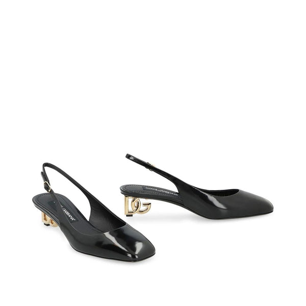 Schwarze Pumps aus Kalbsleder mit Mittelabsatz