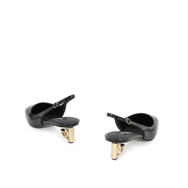 Schwarze Pumps aus Kalbsleder mit Mittelabsatz