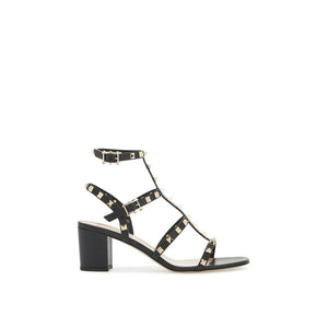 Flache Sandalen aus schwarzem Kalbsleder
